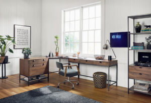 a study room with a table, chair, and rack